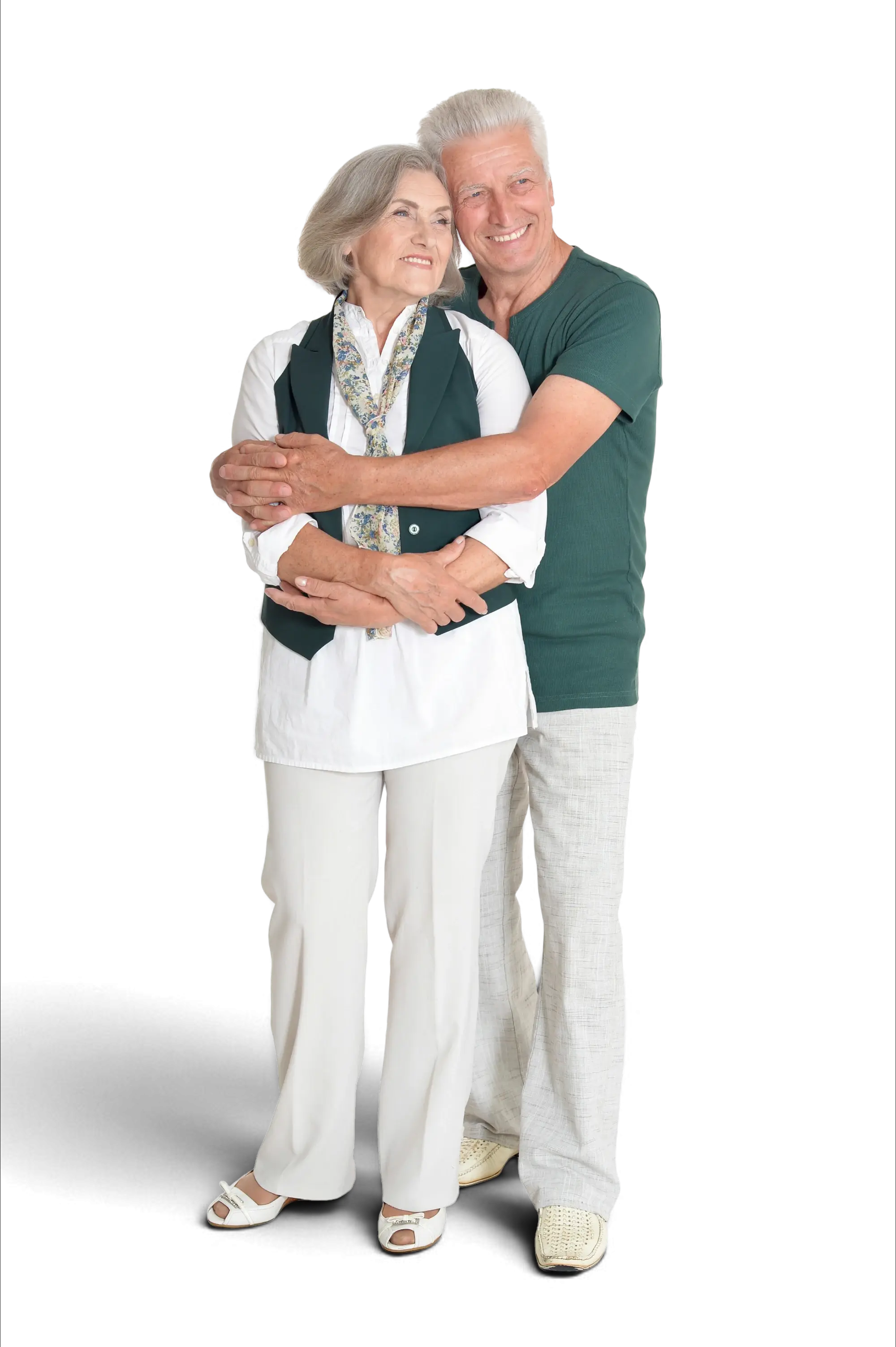Retired couple standing together, ready to go through Medicare